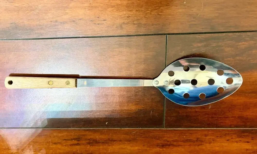 Vintage Stainless Steel Slotted Serving Spoon with Wooden Handle, Made in Japan